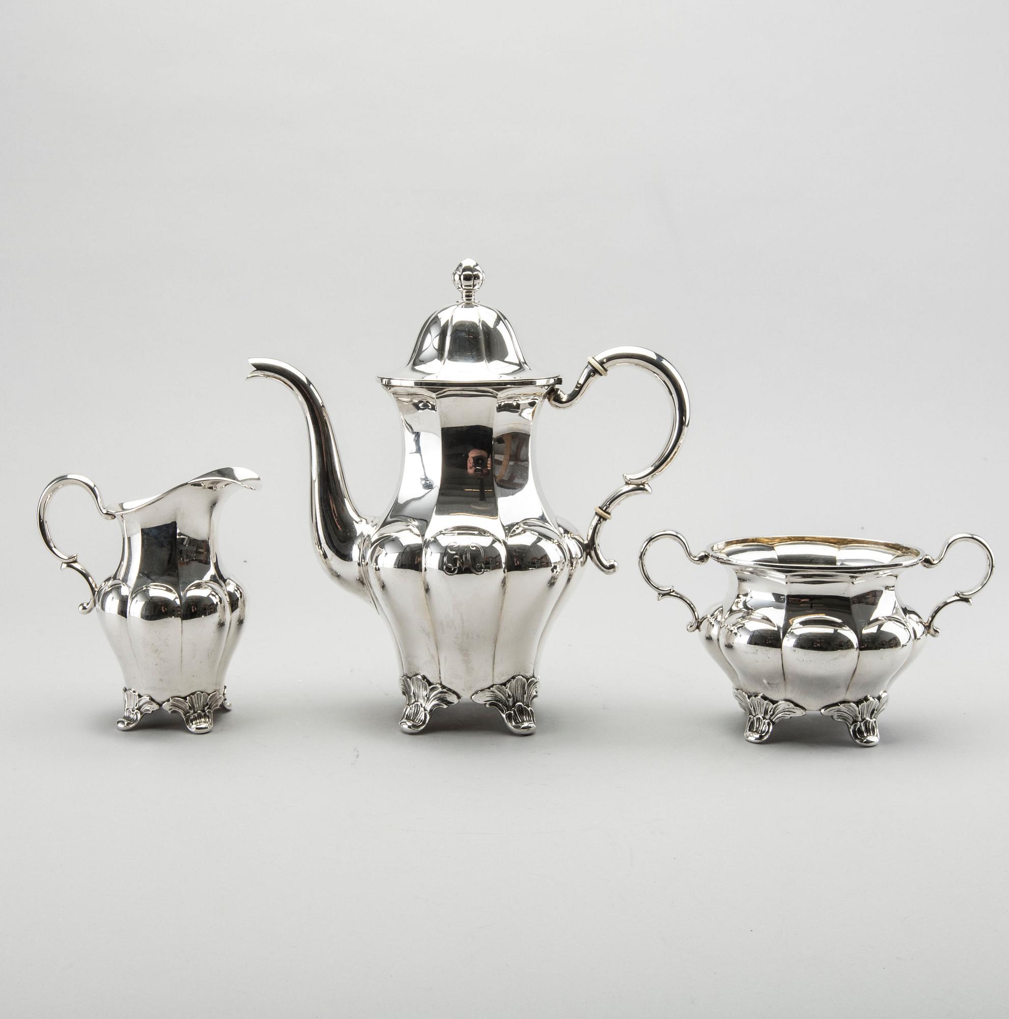 A three piece silver coffee service byGAB AB 1932-33, 1330g.