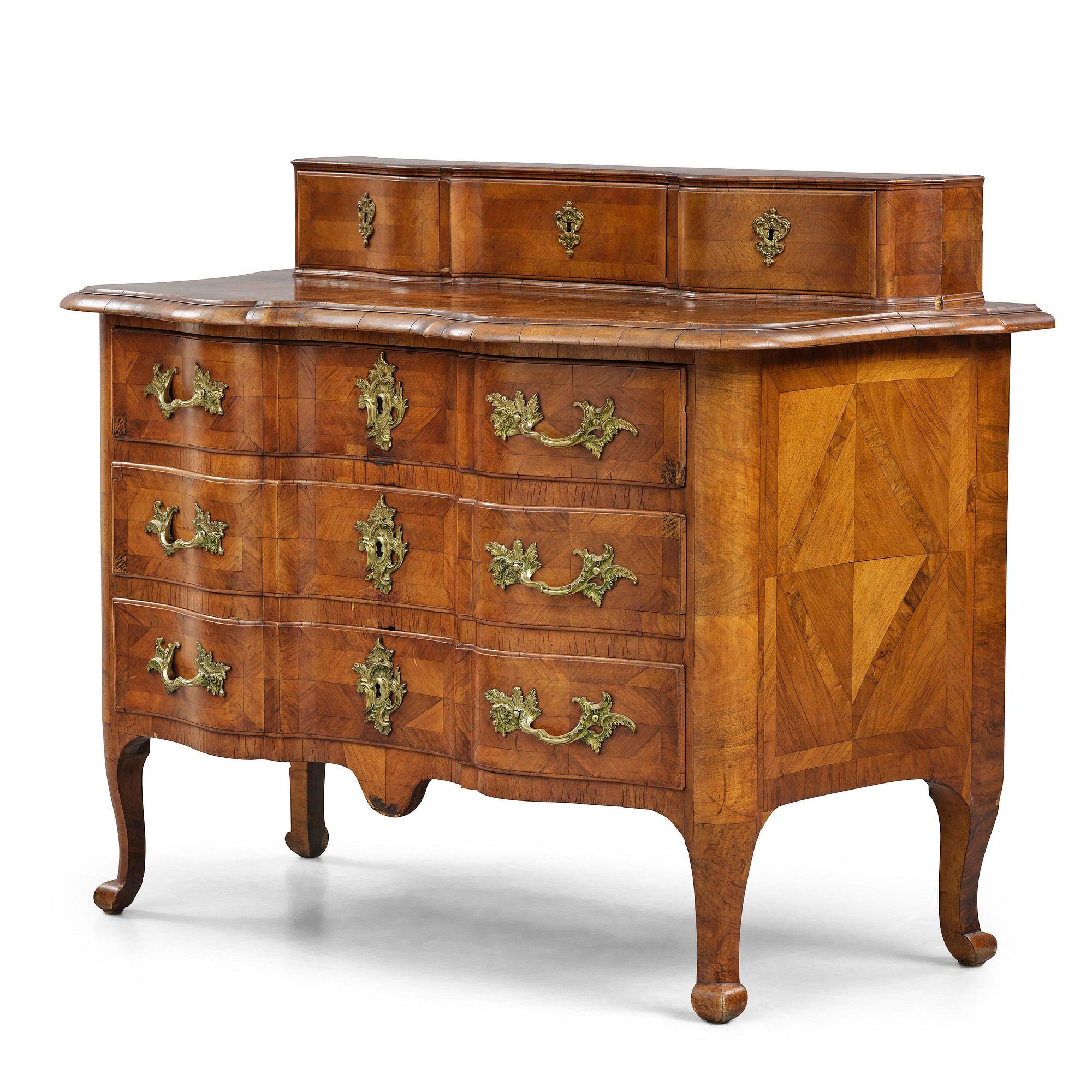 A late baroque walnut parquetry commode by C. Linning (master in Stockholm 1744-79).