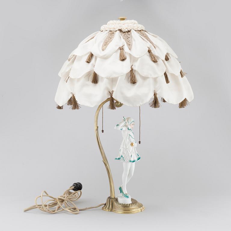 A table lamp with a porcelain figurine by Rosenthal, first half of the 20th century.