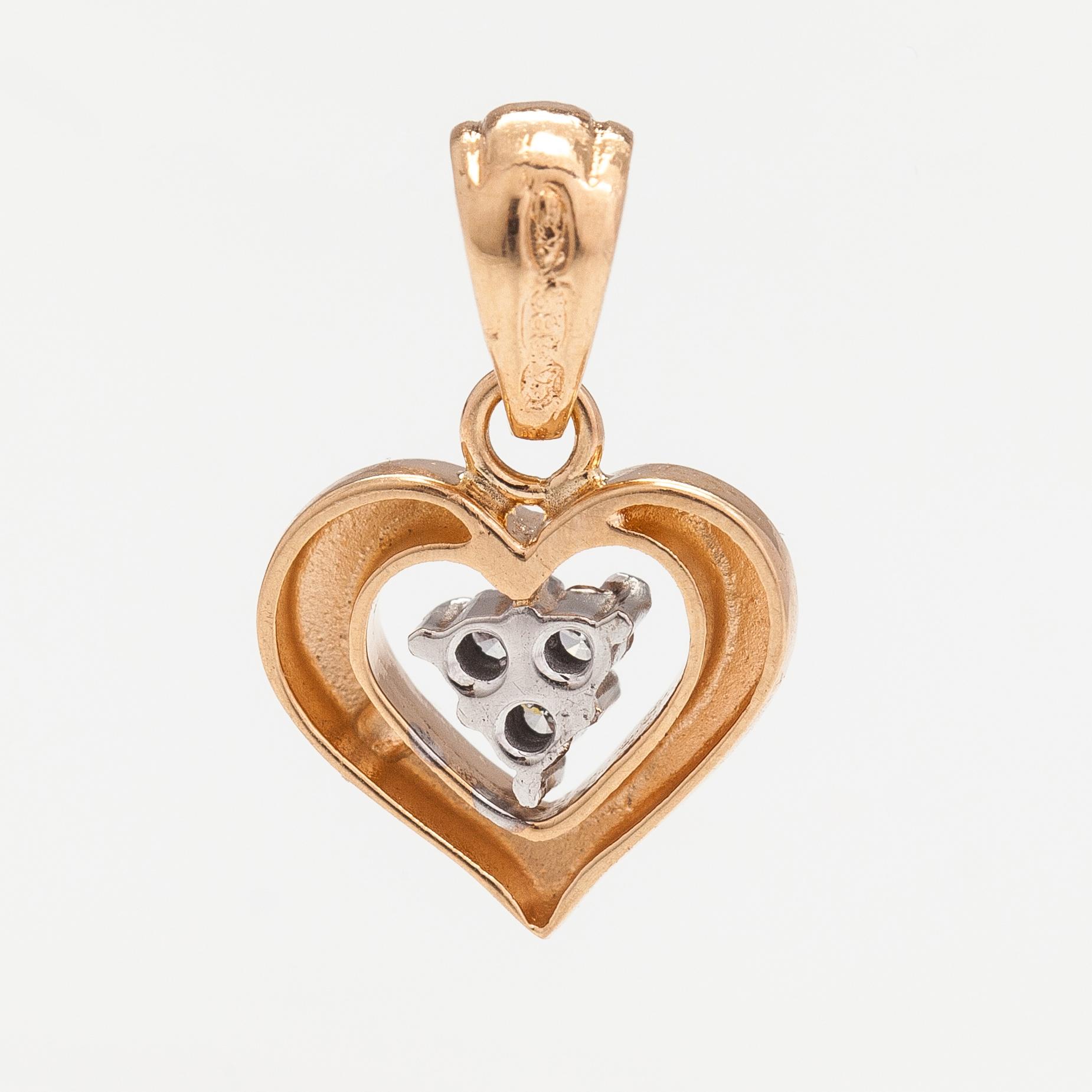 Hänge, 14K guld, diamanter ca 0.045 ct tot. Einari Ailio, Jyväskylä.