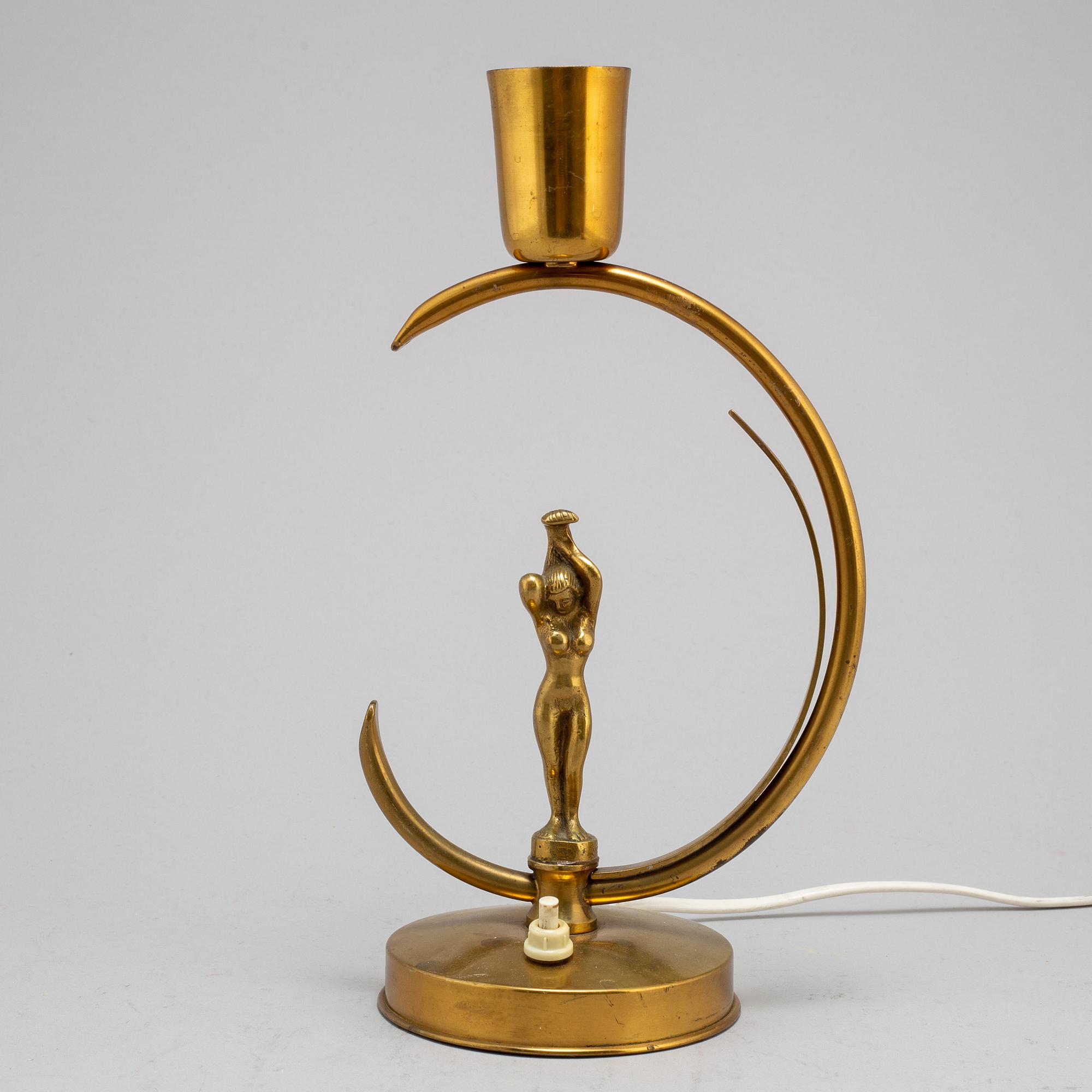 a 1940's-50's brass table lamp by Ystad Metall.