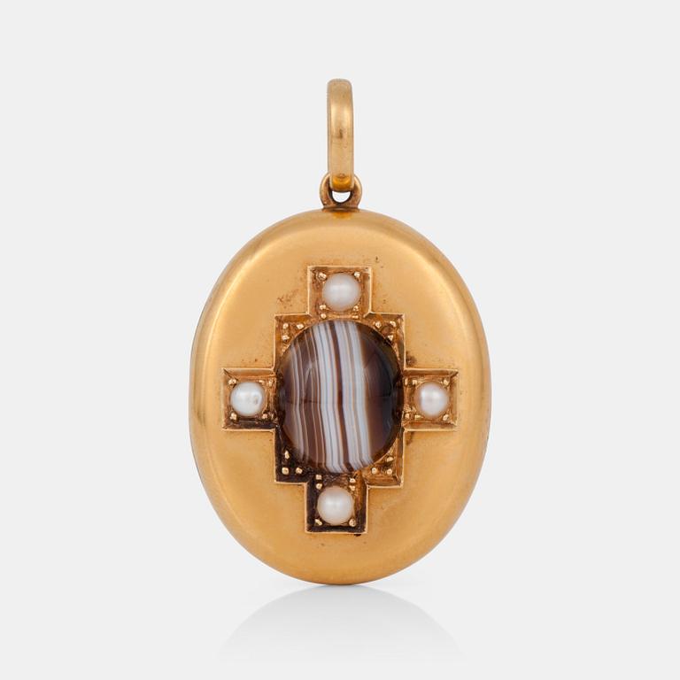 A Victorian pendant locket, decorated with a cross of pearls and a cabochon cut agate.