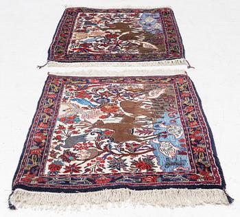 Rugs, a pair, oriental, figural, approximately 96 x 73 cm each.