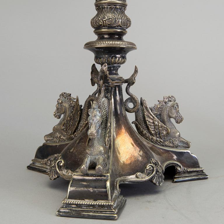 A pair of late 19th century silver plated kandelabras by Henry Wilkinson & Co Ltd, Sheffield, England.