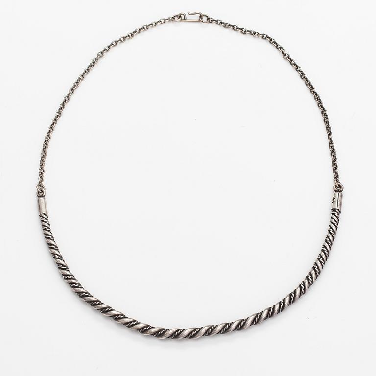 A sterling silver necklace "Twined jewellery from Lampola in Halikko". Kalevala koru, Helsinki 1992.