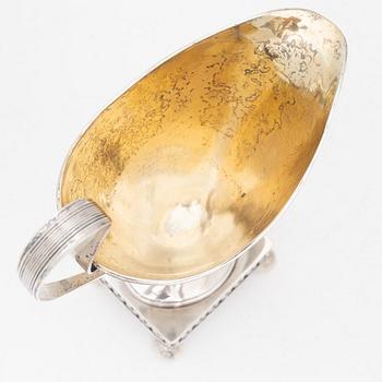 A silver sugarbowl with lid and a creamer, marks of Olof Hellbom, Stockholm, Sweden 1799-1800.