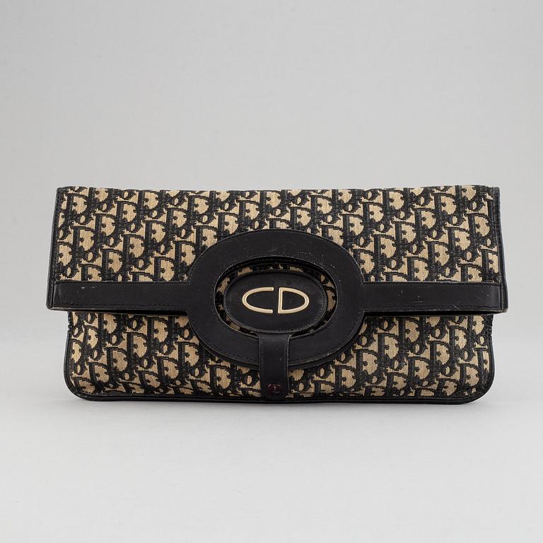 Christian Dior, a 'Oblique fold-over convertible clutch'.