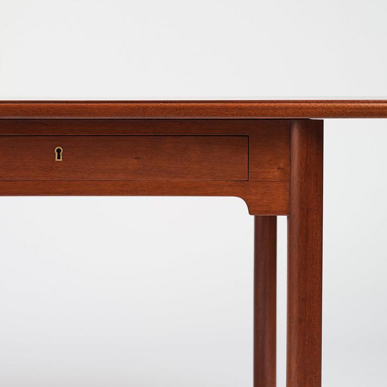 Mogens Koch, an important free standing mahogany desk by N.C. Jensen Kjær, Denmark 1930's.