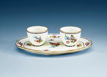A French 'Sèvres' tray with two cups, presumably 18th Century.