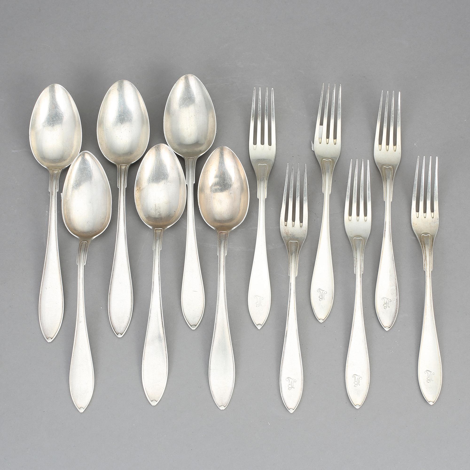 BESTICK, 12 st, silver, modell svensk spets. Tot vikt ca 495 g.