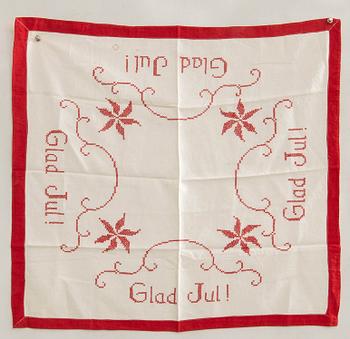 A collection of Christmas tablecloths 12 pcs first half/mid 20th century.