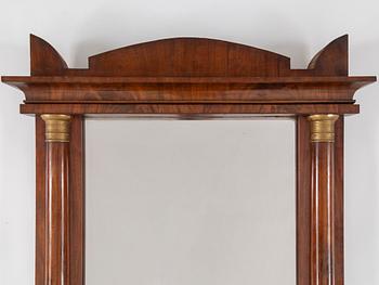 A Swedish Empire mirror and console table, first half of the 19th century.