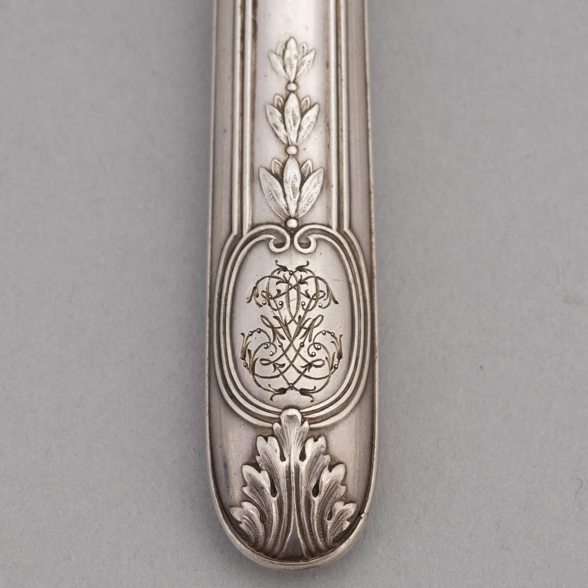 A set of twelve French silver lobster cutlery, 19th century.