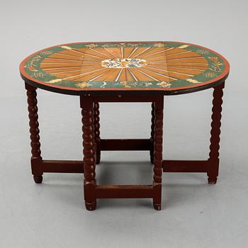 A painted Baroque style gate-leg table, early 20th Century.