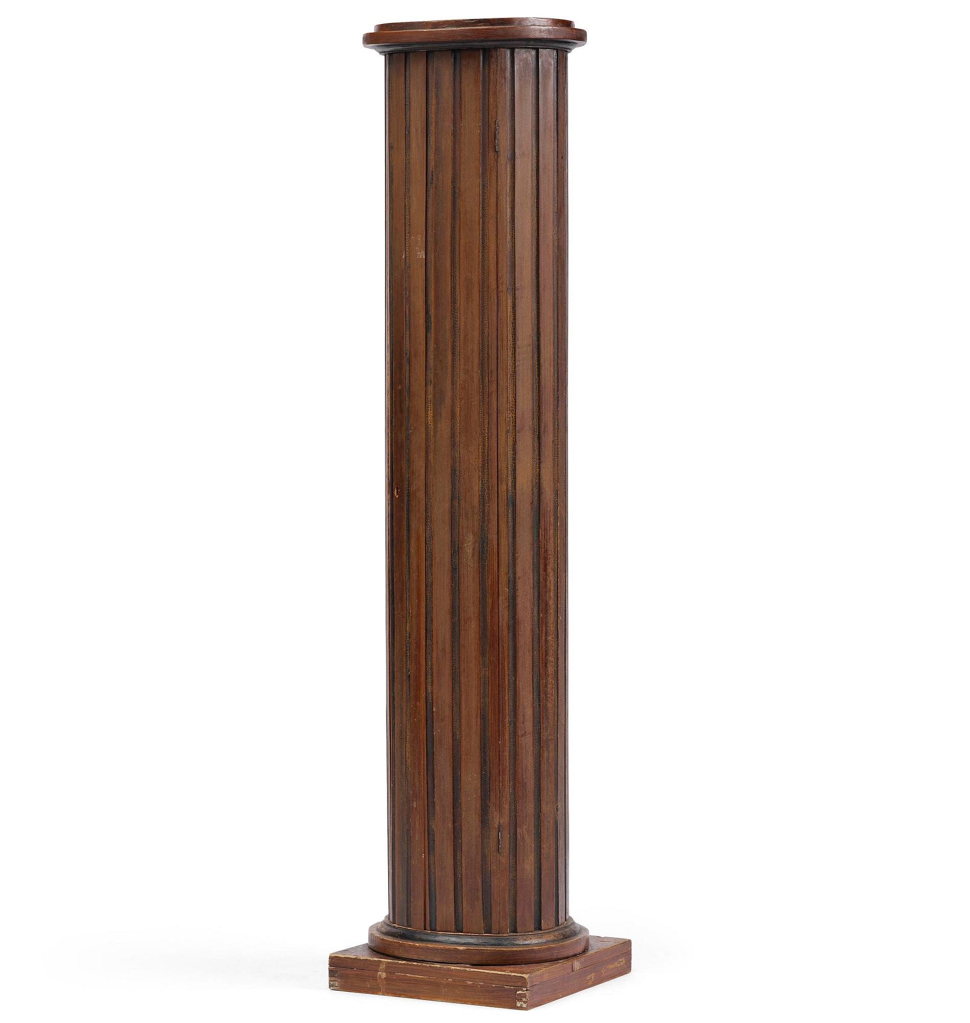 A Swedish Empire column-shaped cabinet, first part 19th century.
