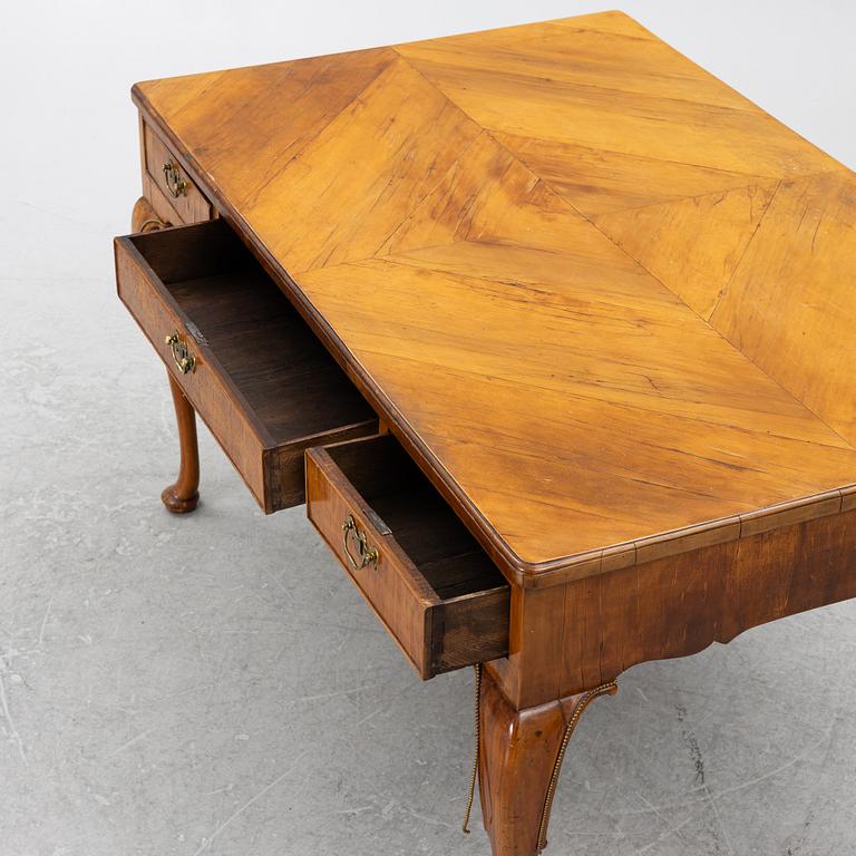 A George II walnut partner's desk, mid 18th century.