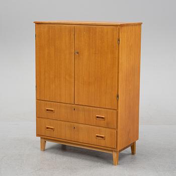 A 1950's/60's teak cabinet.