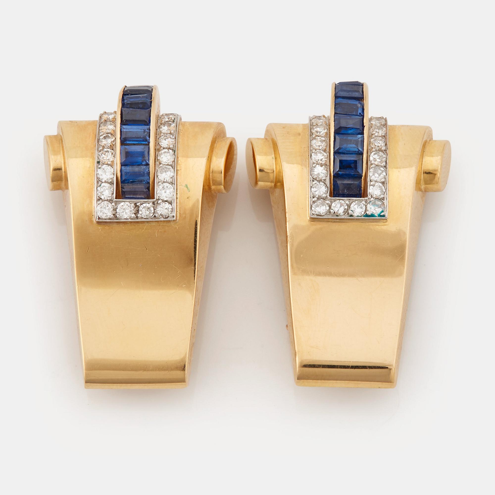 A pair of 1940/50's brooches by Boucheron, set with baguette cut sapphires, brilliant- and single cut diamonds.