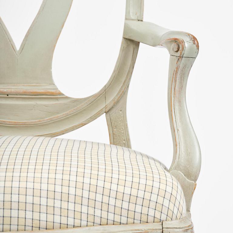 A pair of Gustavian open armchairs, Stockholm, late 18th century.