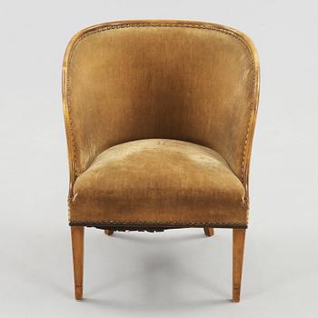 A Swedish Grace elm armchair, 'Bellman', attributed to Axel Einar Hjorth, Nordiska Kompaniet 1930.
