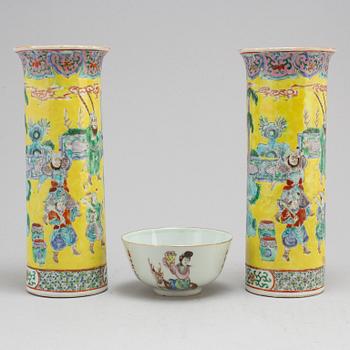 A Chinese famille rose bowl and a pair of sleeve vases, early 20th century.