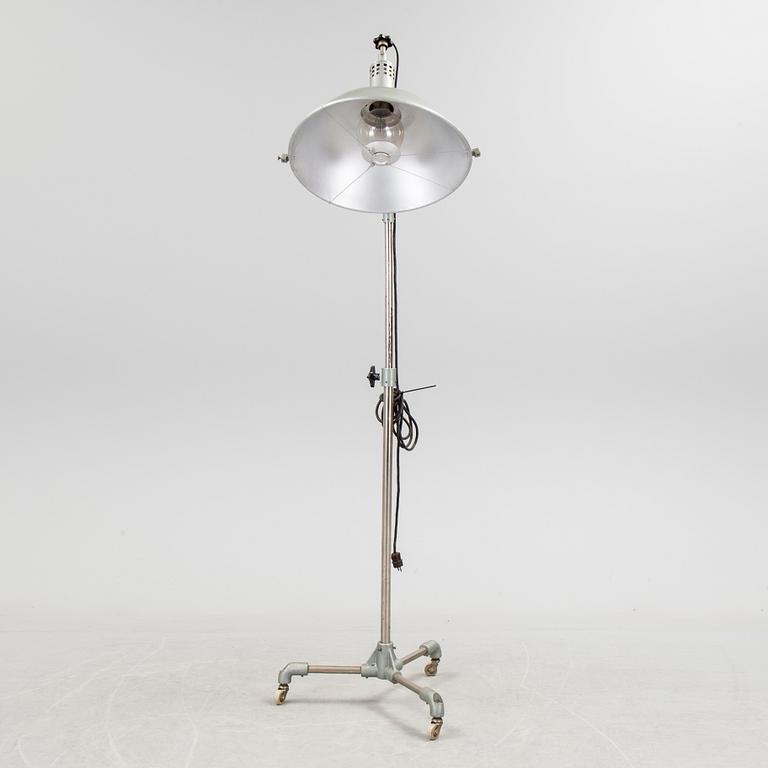 A German metal floor light from the mid 20th century.