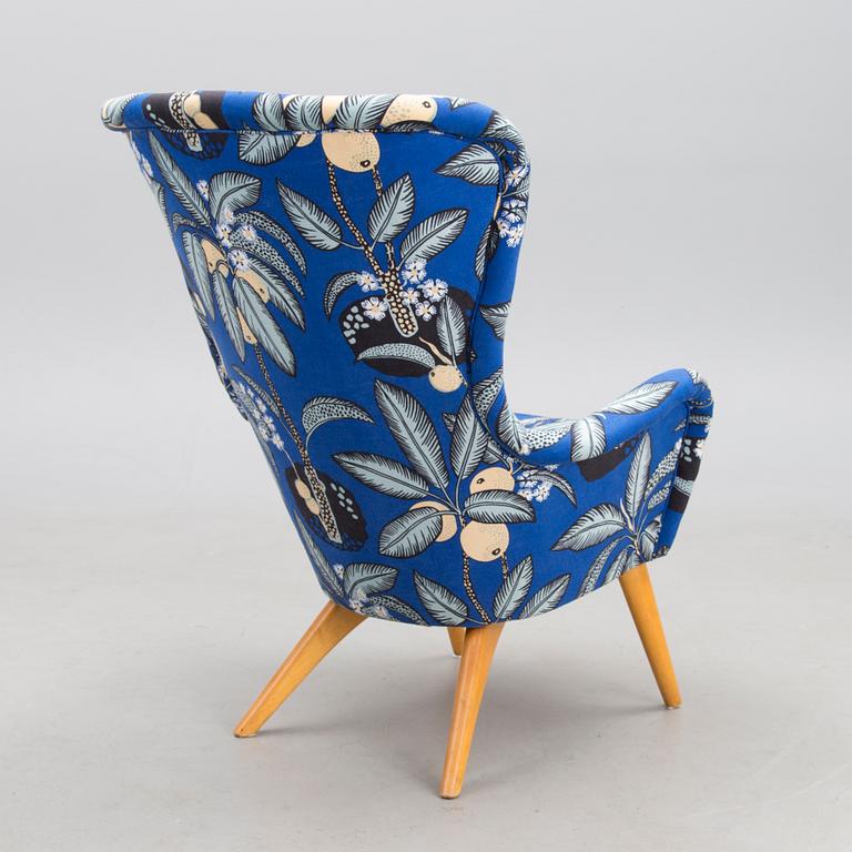 A mid-20th century armchair 'Siesta' manufacturer  Puunveisto Oy - Träsnideri Ab, Finland.