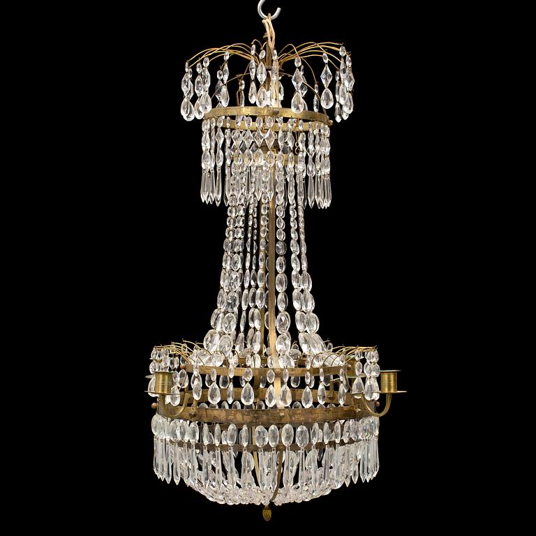 An early 20th century late gustavian style chandelier.