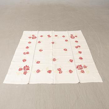 A collection of Christmas tablecloths 12 pcs first half/mid 20th century.