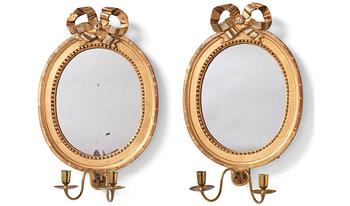 91. A pair of Gustavian two-light girandole mirrors.