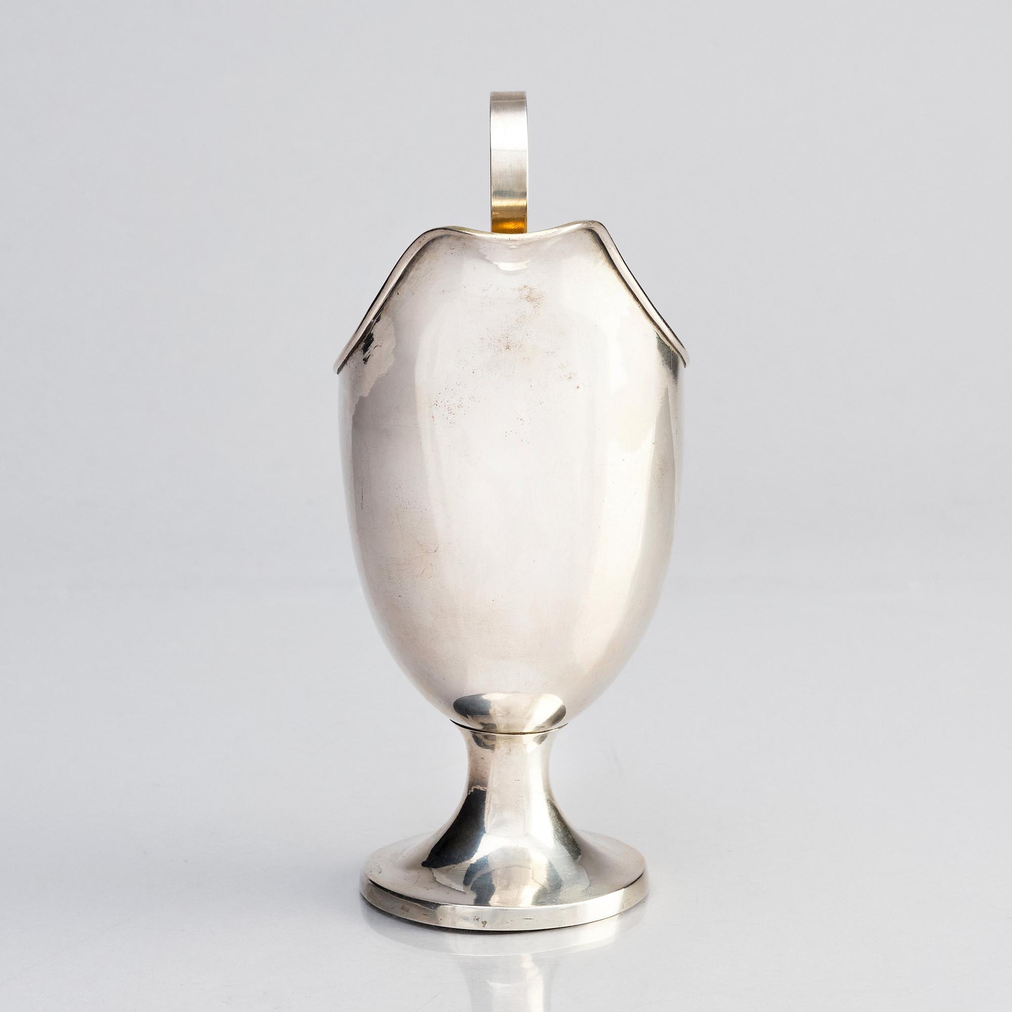 A Swedish parcel-gilt silver cream-jug, mark of Gustaf Hagström, Stockholm 1807.