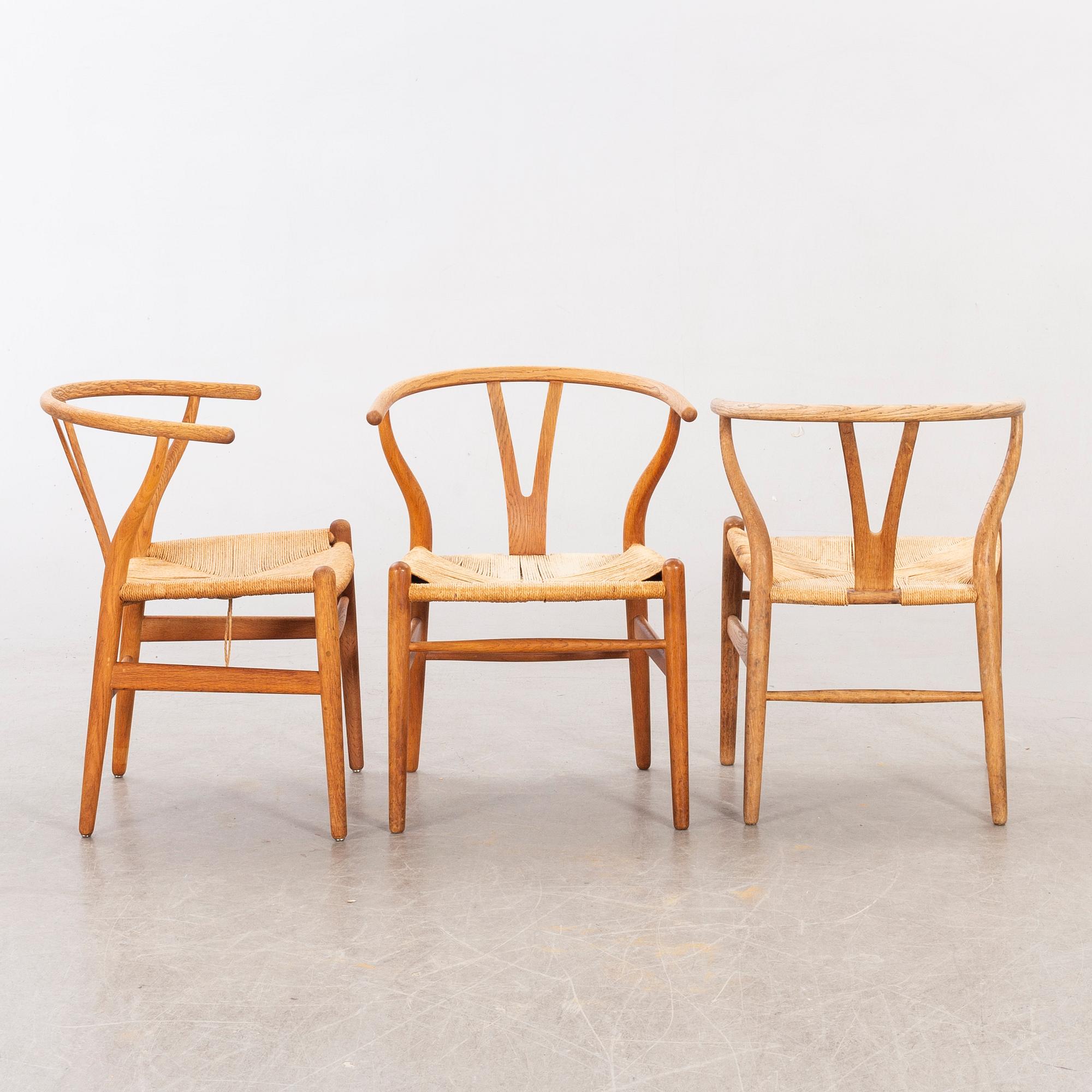 Hans J Wegner, five CH 24 chairs  Carl Hansen & Son, Odense, Denmark.