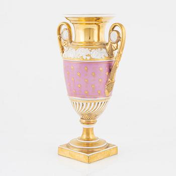 A gilt Empire porcelain vase, 19th Century.