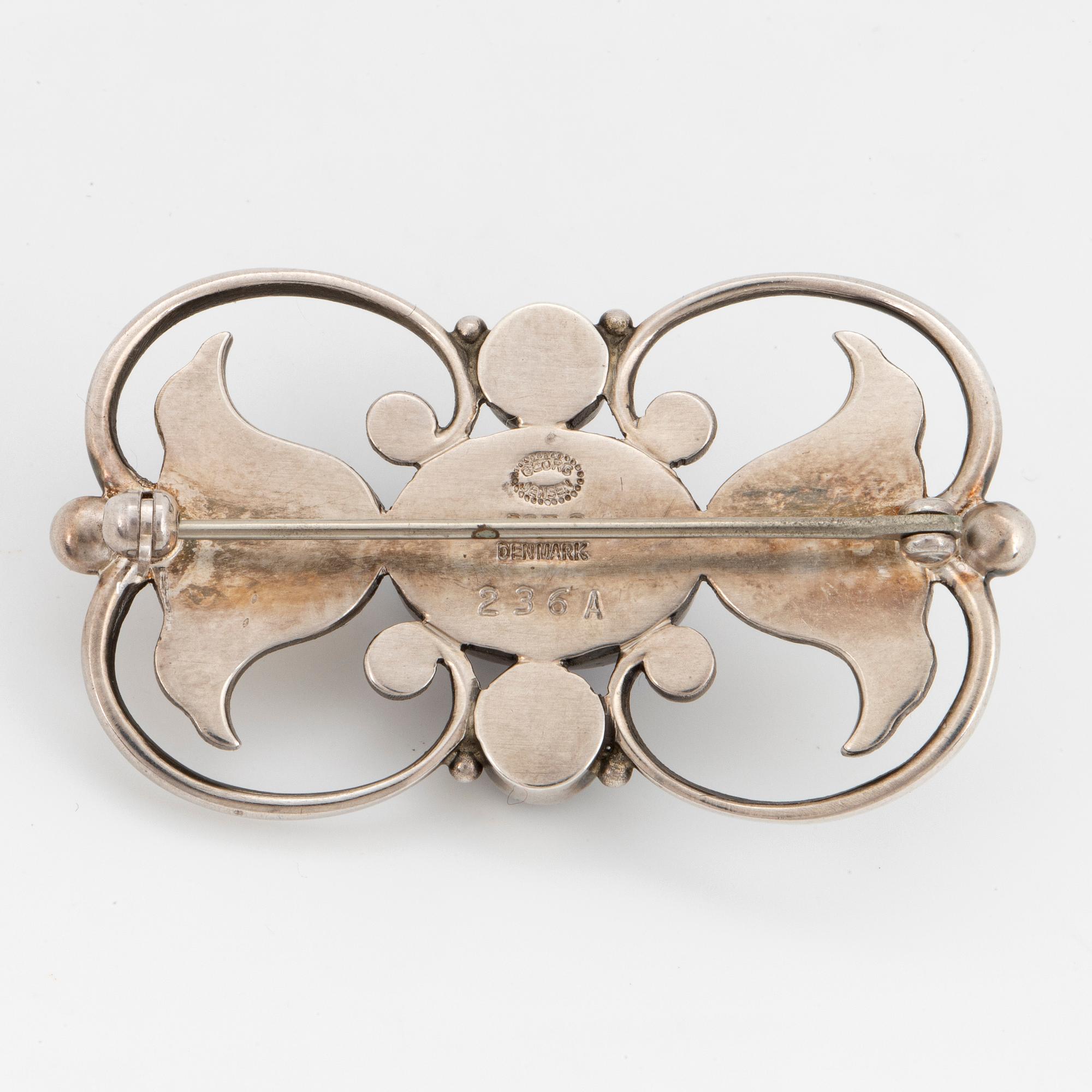 A Georg Jensen brooch 236A silver set with lapis lazuli.