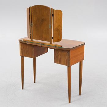 A Swedish modern teak-veneered dressing table, Fröseke, mid 20th century.