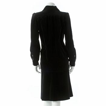 YVES SAINT LAURENT, a two-piece black velvet dress consisting of jacket and skirt, from the Russian collection.