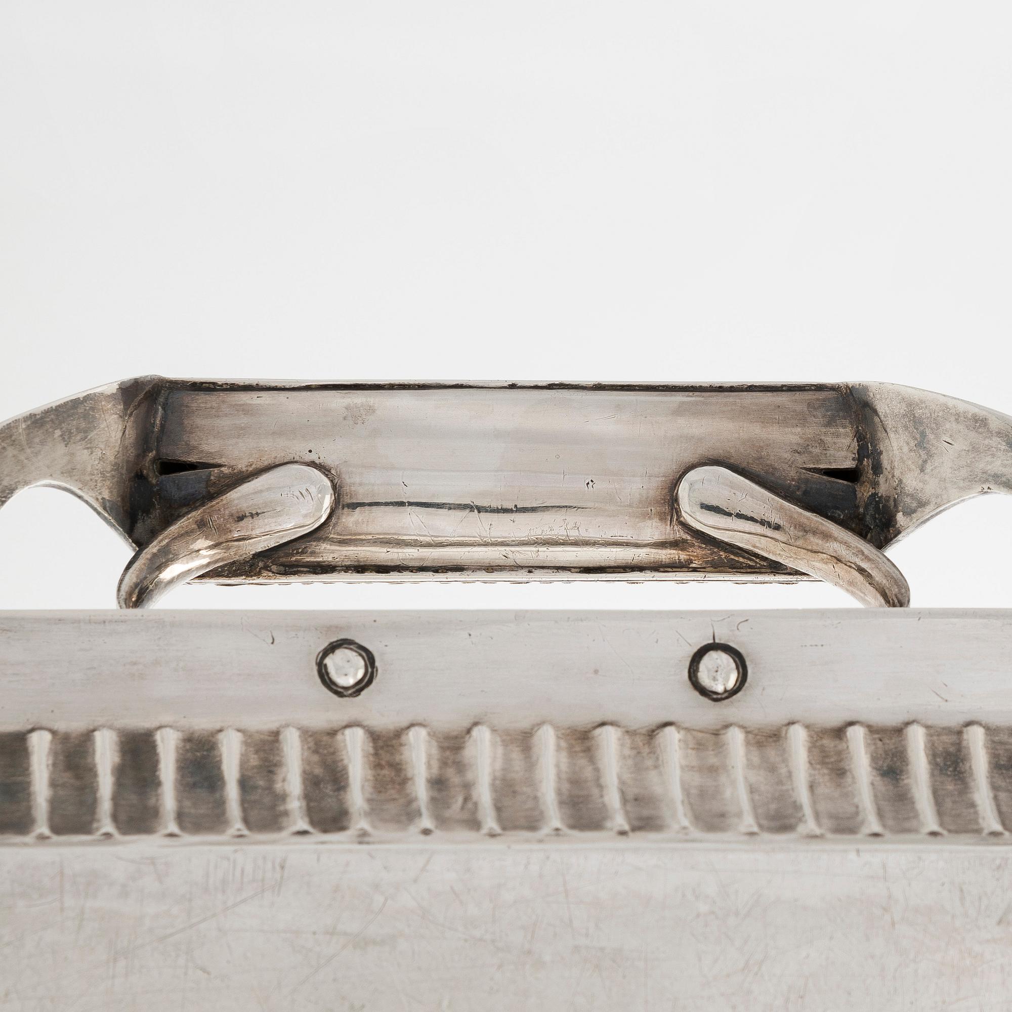 A silver tray, maker's mark of Henrik Tallberg, St. Petersburg 1832.
