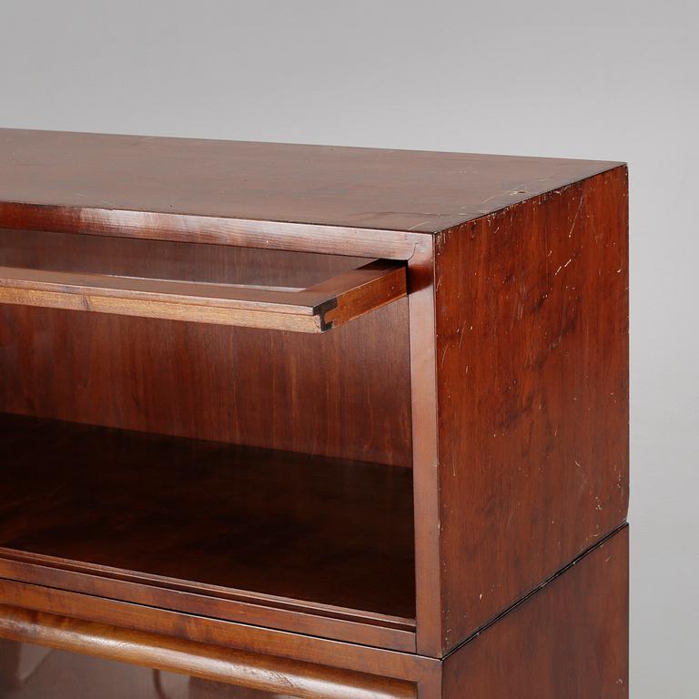 Two bookshelfs from the first half of the 20th century.