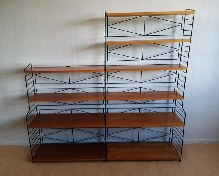 Nils Strinning, a 'String' teak veneer book shelf system.