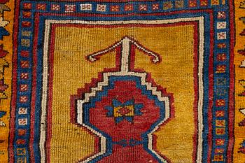 An antique prayer rug, central Anatolia, c.. 92 x 77 cm.