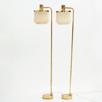 Hans-Agne Jakobsson, a pair of brass and tassel floor lamps for Markaryd AB Sweden, 1960-70's.