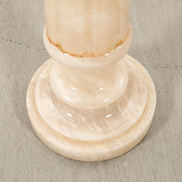 An alabaster pedestal later part of the 20th century.