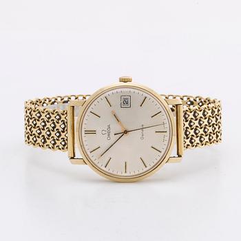 An Omega Genève 14K gold wrist watch, bracelet 18K, 34 mm.