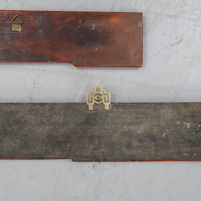 Two Chinese red lacquered wooden panels, 20th century.
