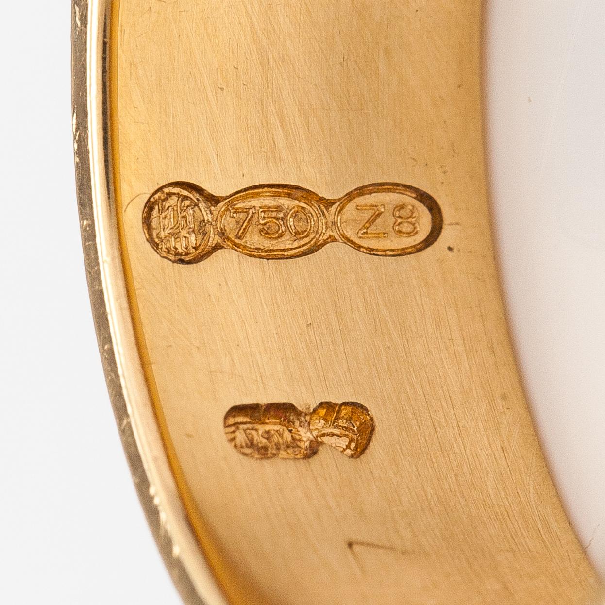 Sormus "Metsäpirtti", 18K kultaa. Kalevala Koru, Helsinki 2001.