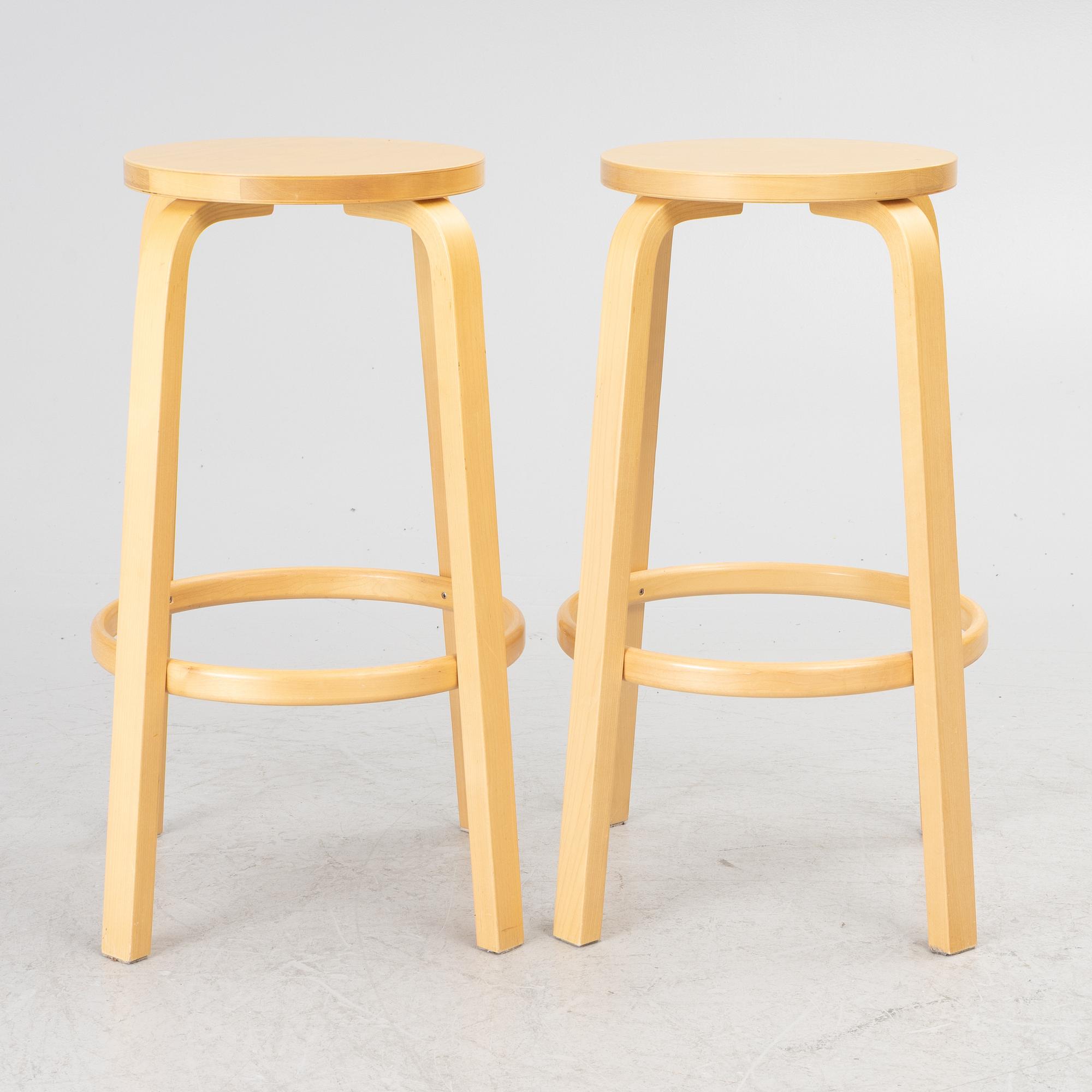 Alvar Aalto, a pair of bar stools, Artek, Finland, 2002.