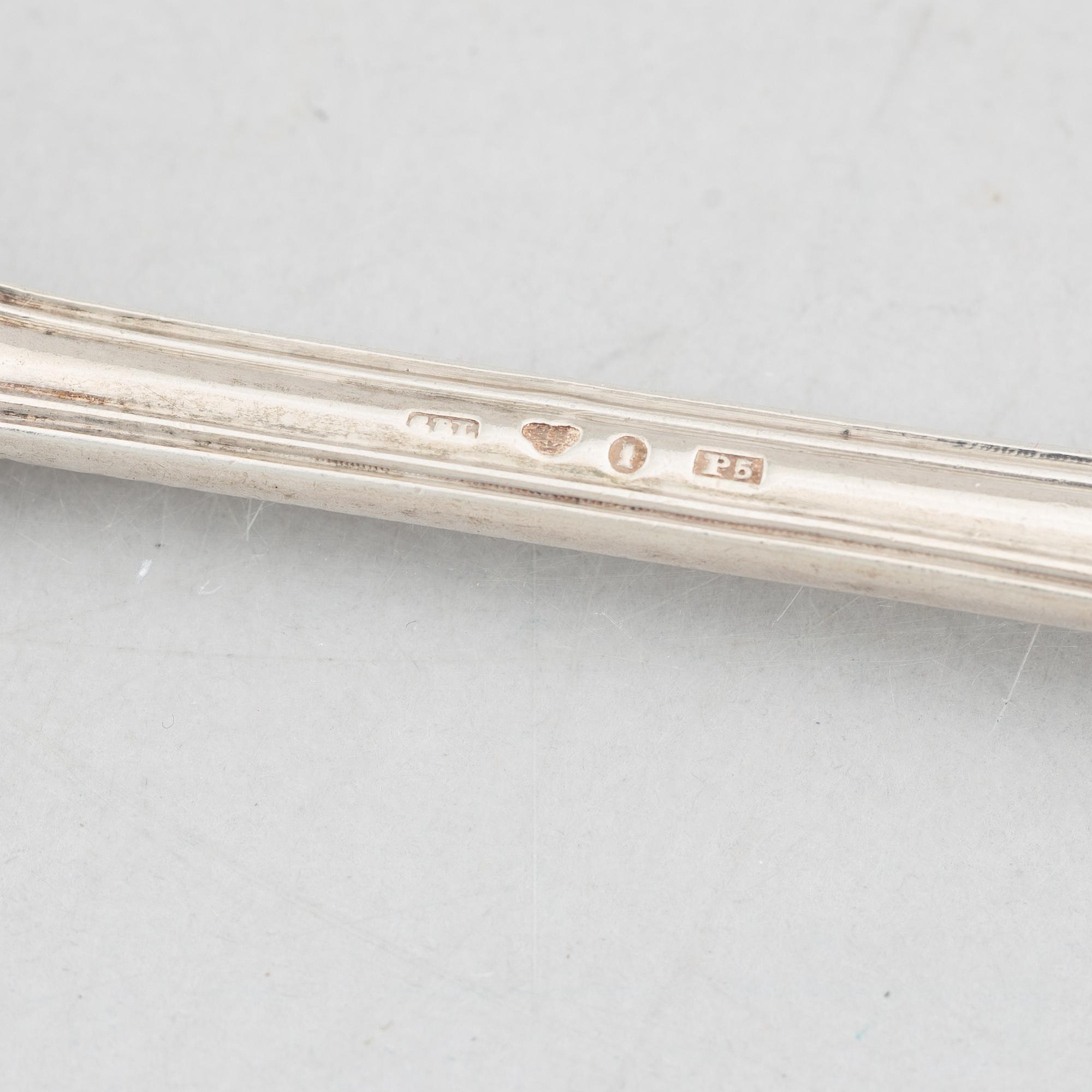 A Set of Twelve Swedish Silver "Kings Pattern" Dinner Spoons.