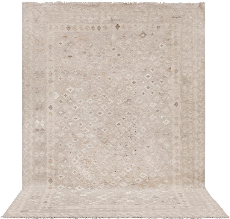 A kilim carpet, c 285 x 206 cm.