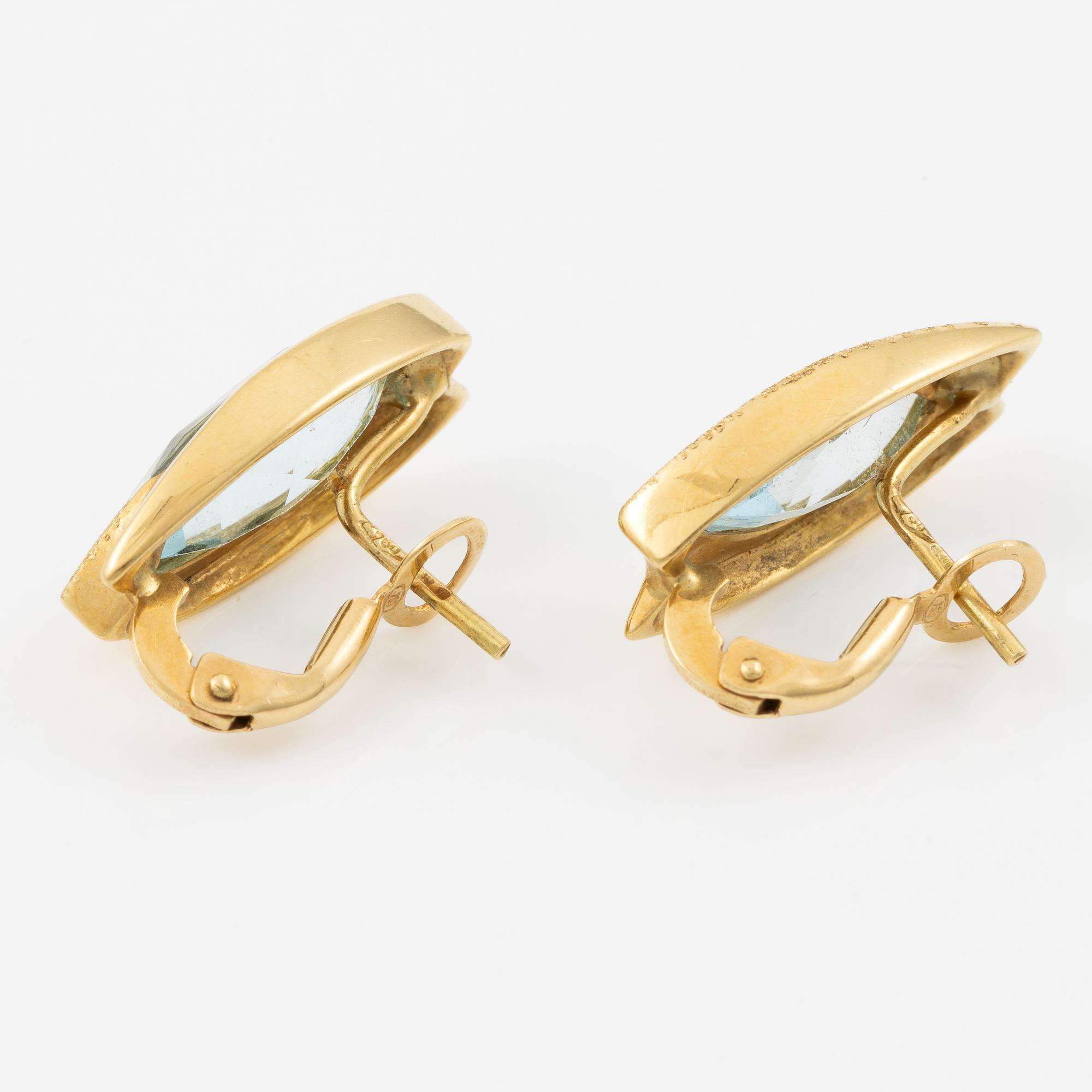 Earrings, 18K gold set with navette-cut blue topazes.