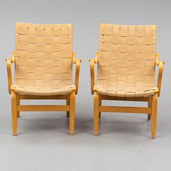 A pair of 'Eva' easy chairs by Bruno Mathsson, Firma Karl Mathsson, Värnamo 1973.